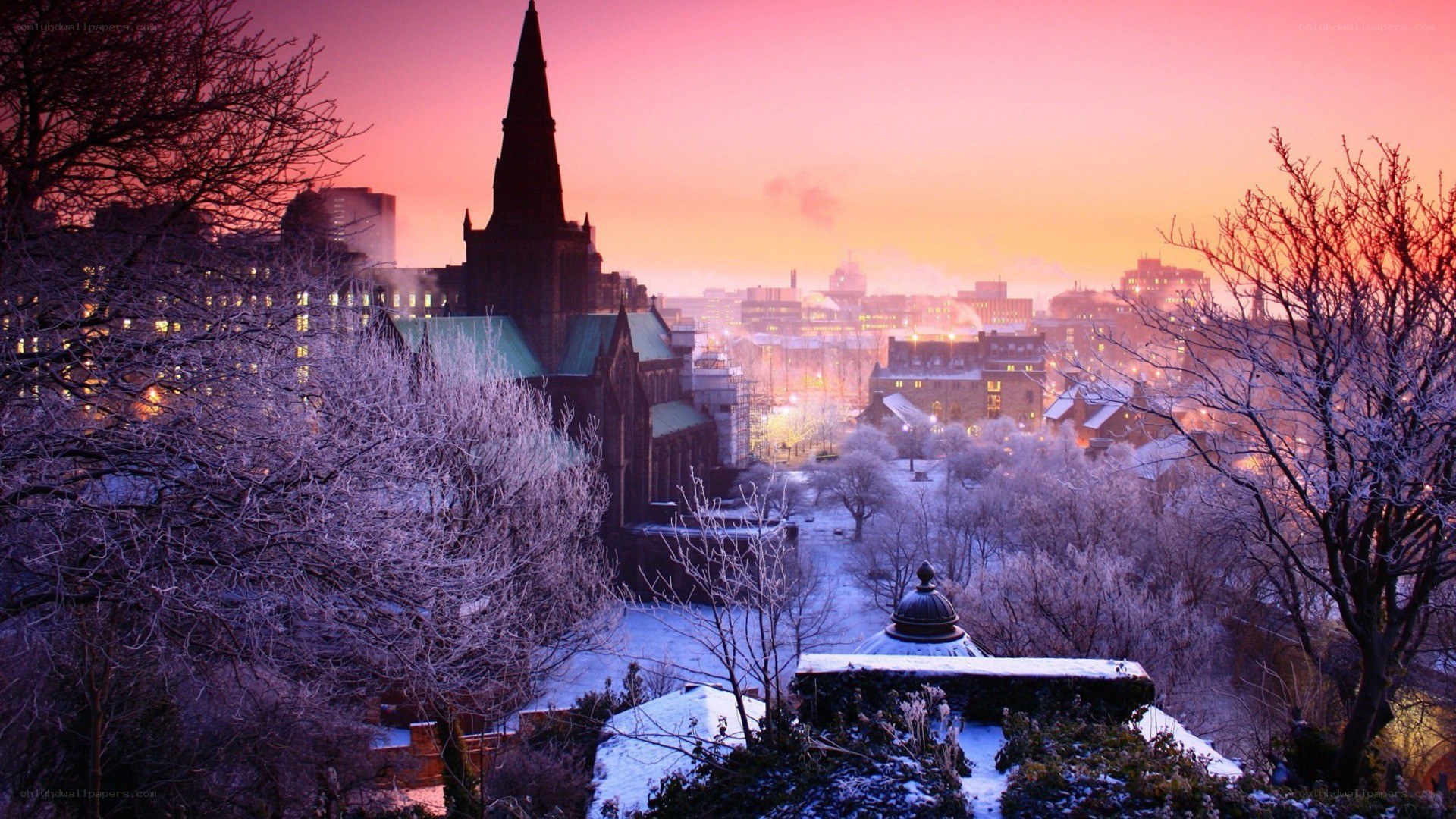snowy city at sunset