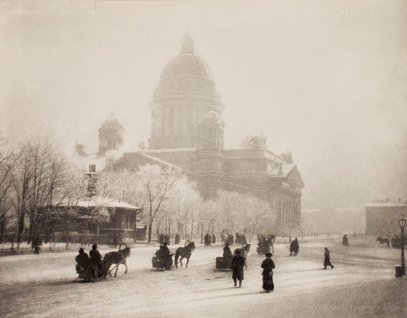 Snowy city square with cathedral