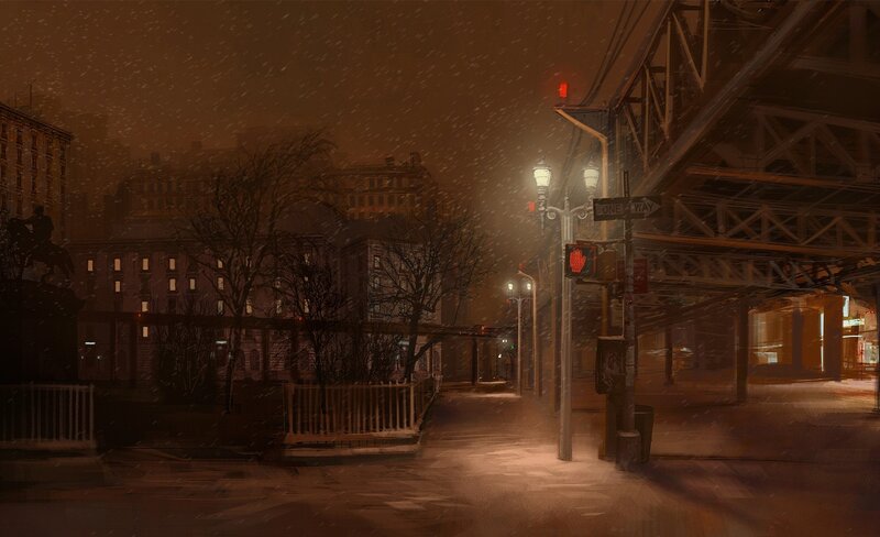Snowy city street at night