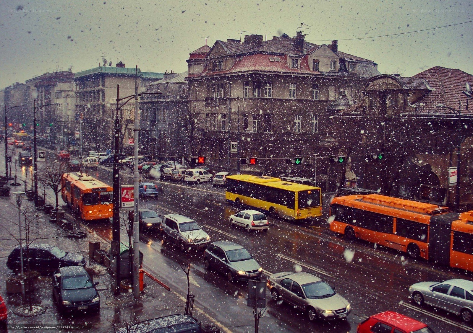 Snowy city street traffic