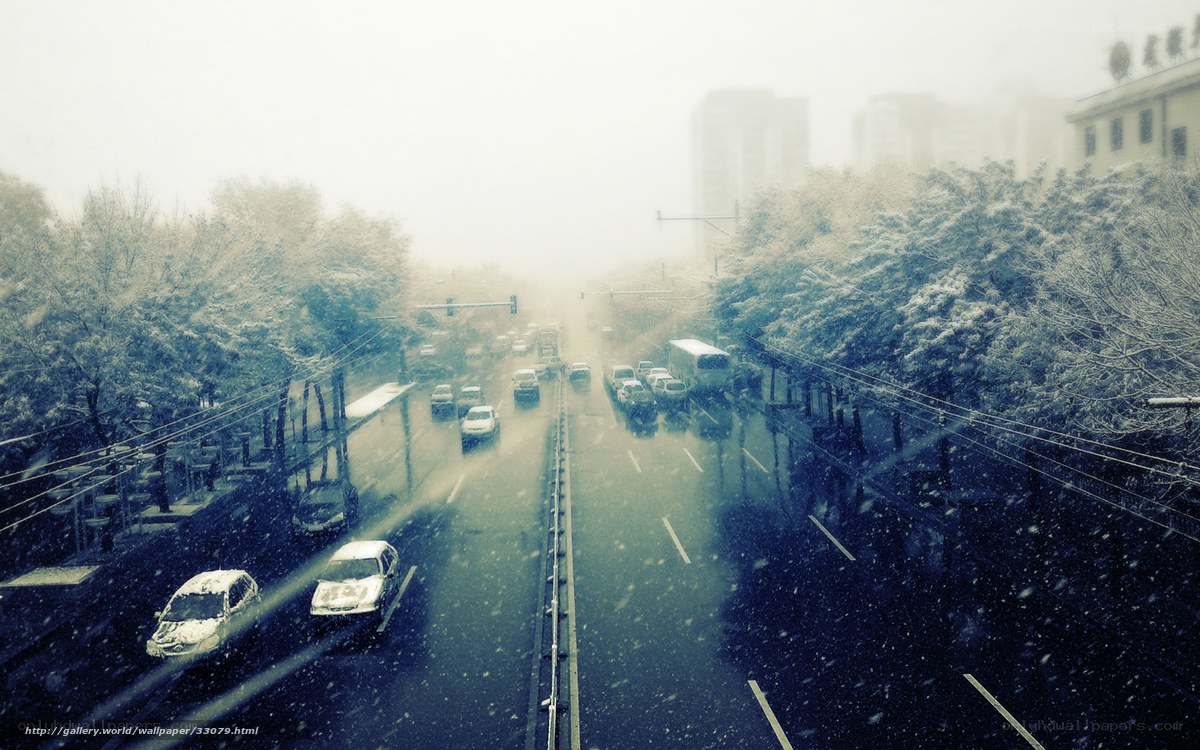 Snowy city street traffic