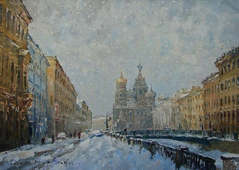 Snowy city street with cathedral