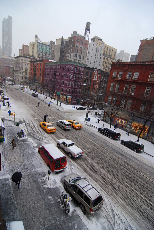 Snowy city street with taxis
