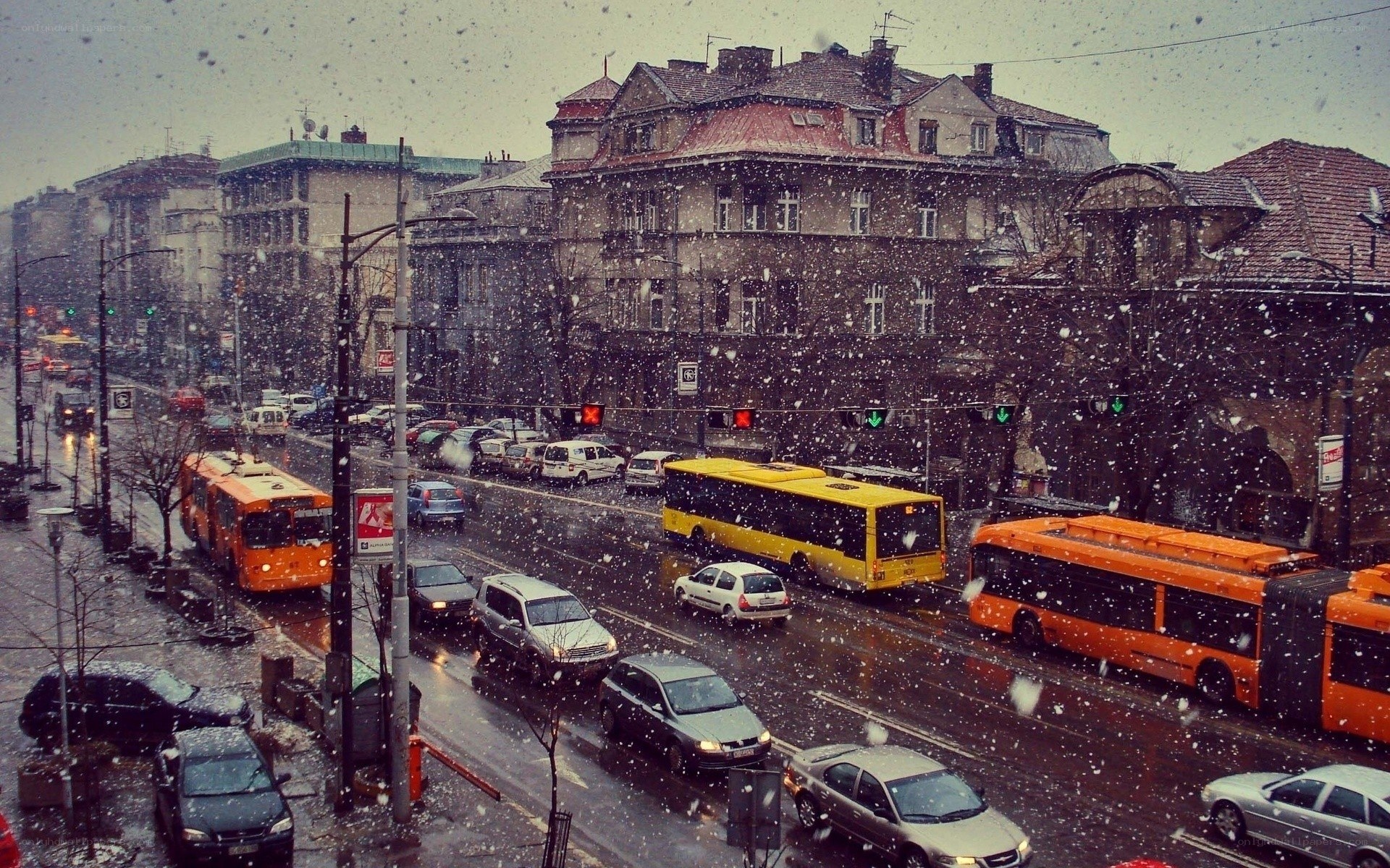Snowy city traffic scene