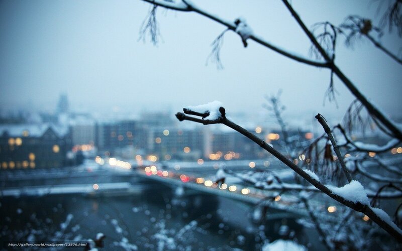 Snowy city view at dusk