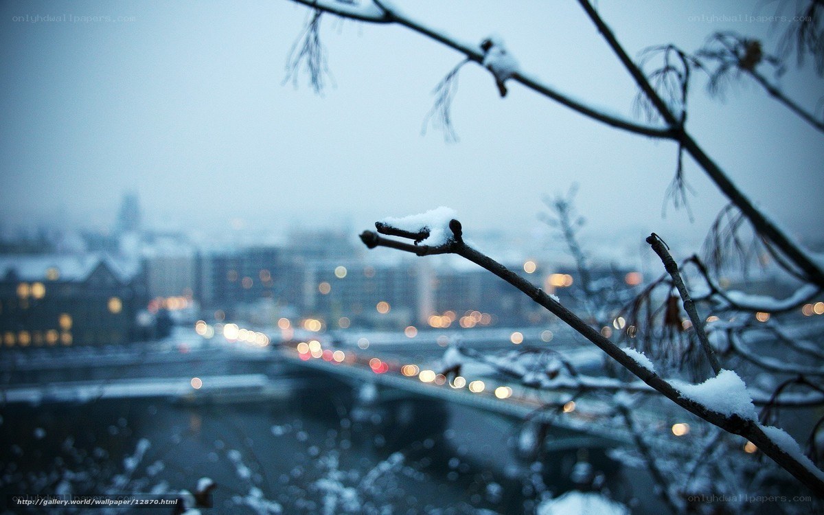Snowy city view at dusk