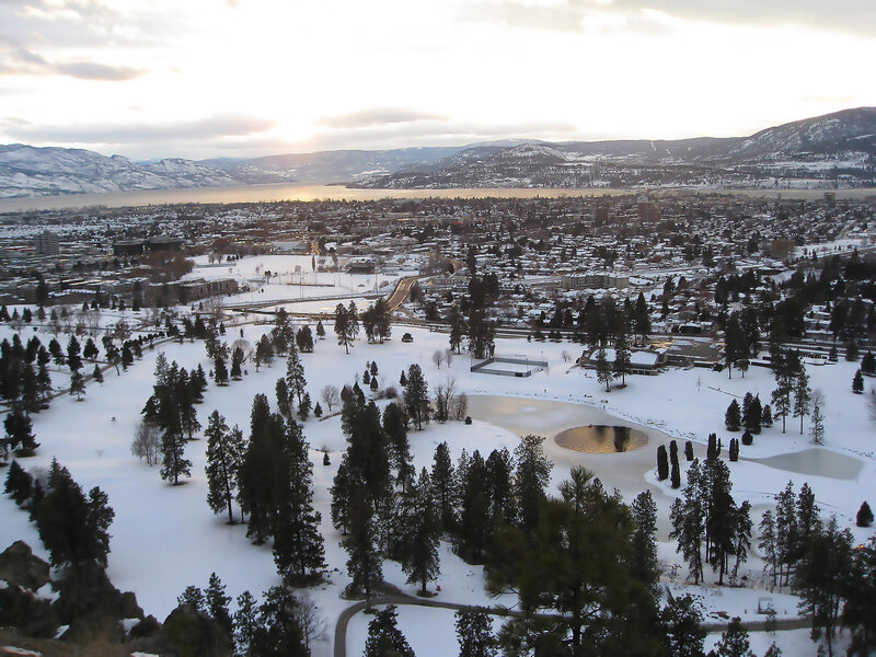 Snowy city view at sunset