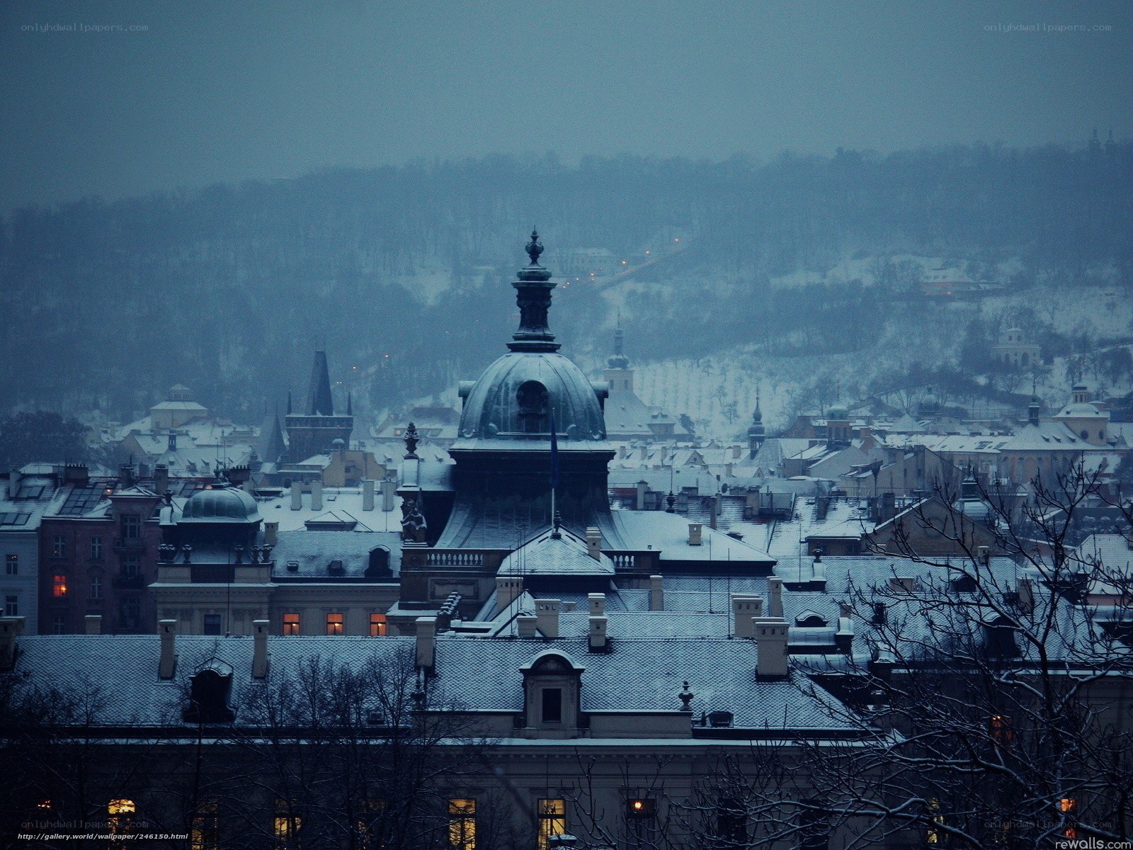 Snowy cityscape at dusk