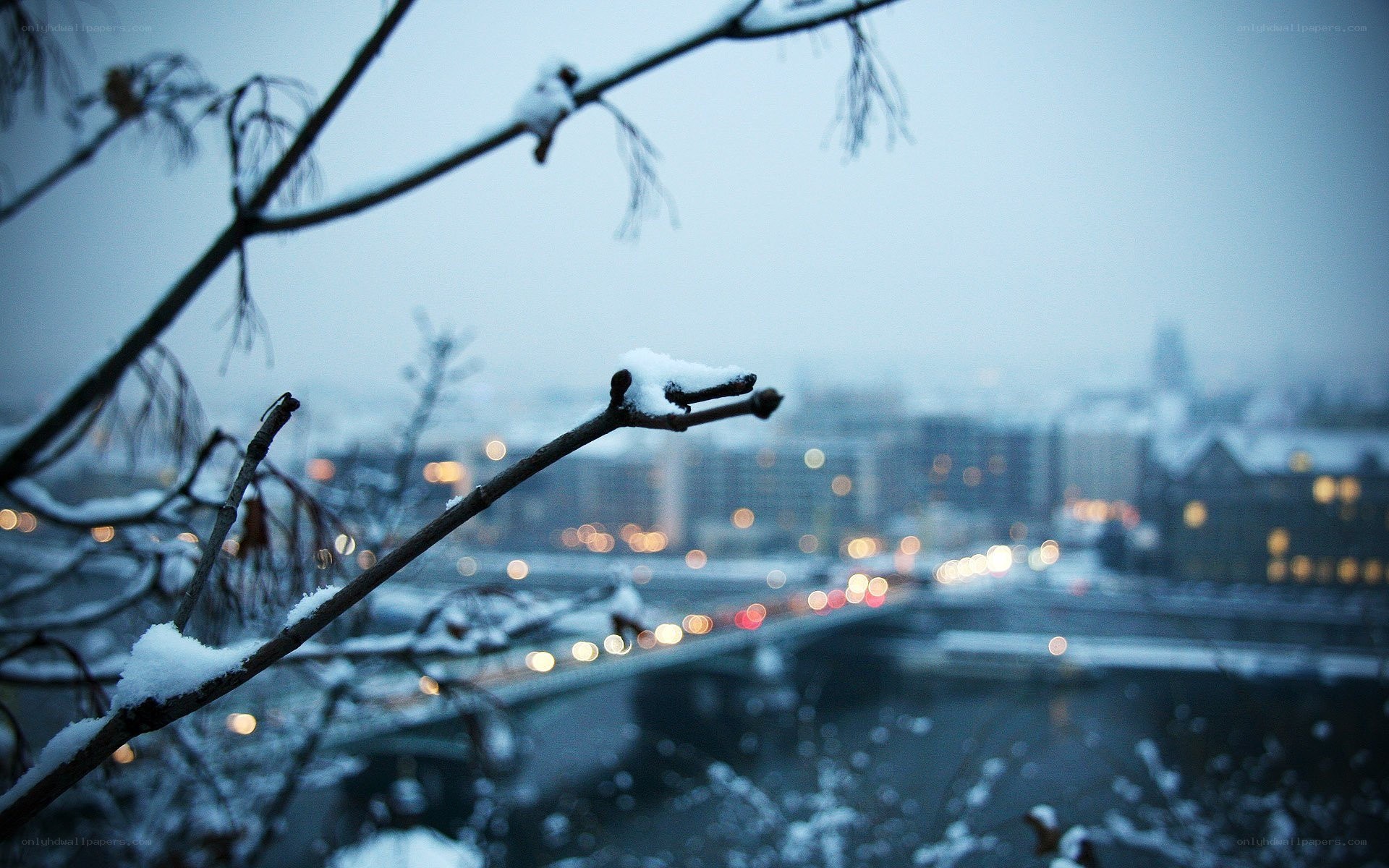 Snowy cityscape at dusk