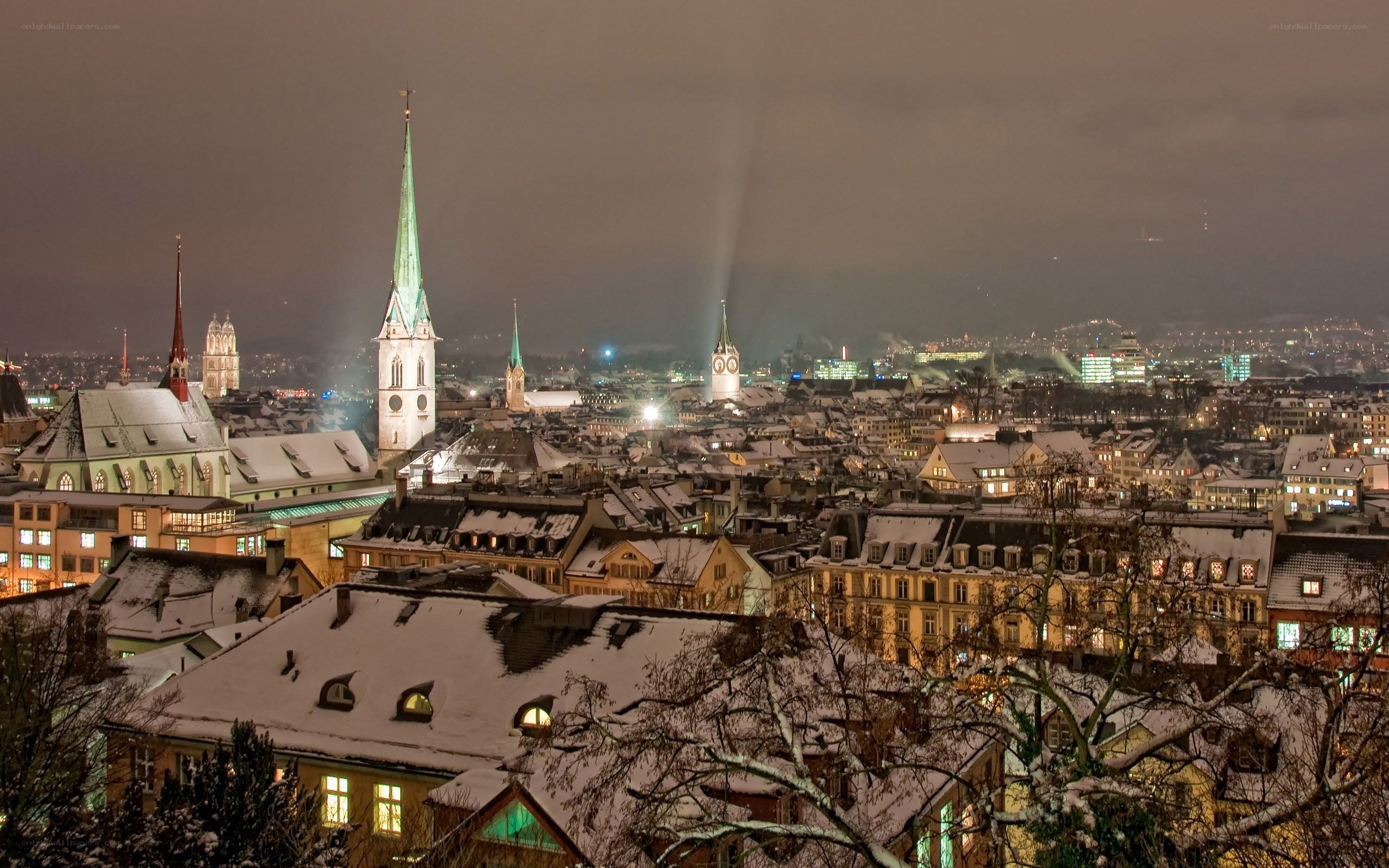 snowy cityscape at night