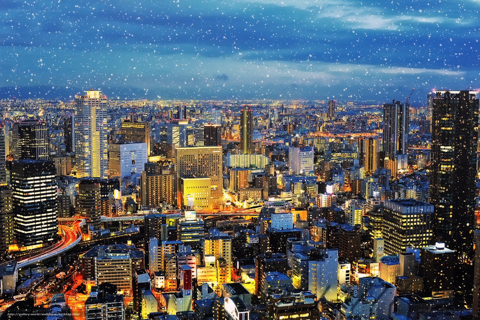 snowy cityscape at night