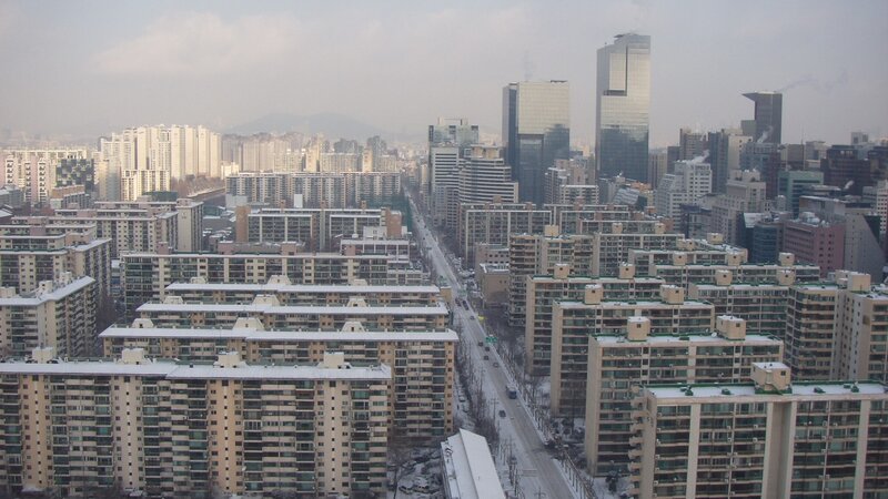 snowy cityscape with high-rises