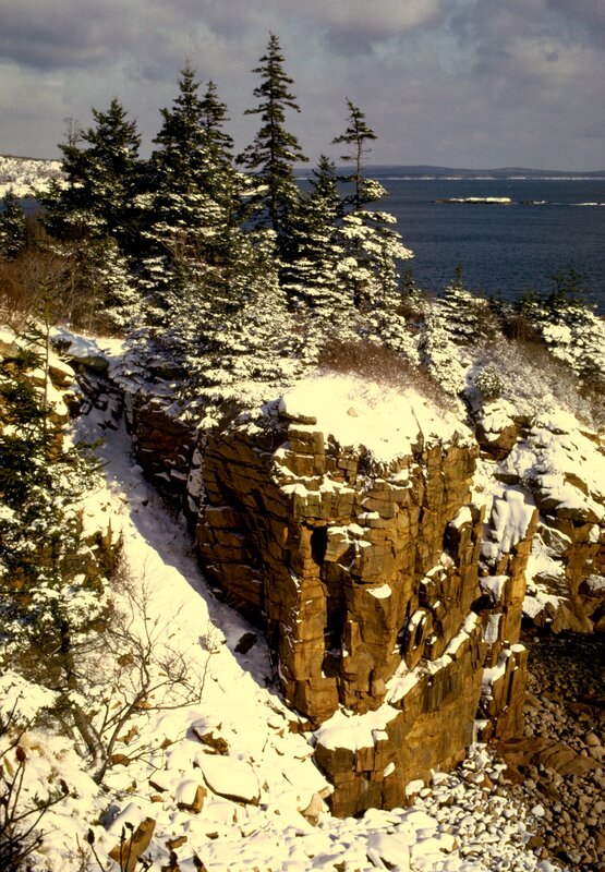 Snowy cliffs by the sea