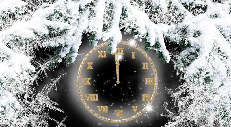 Snowy clock at midnight