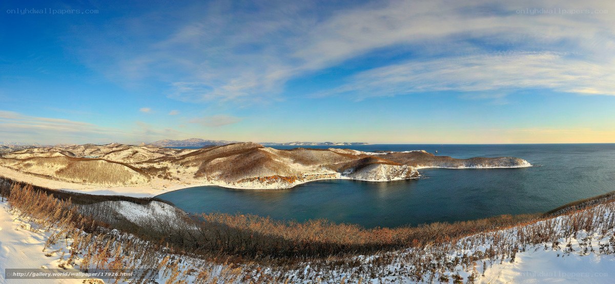 Snowy coastal landscape panorama