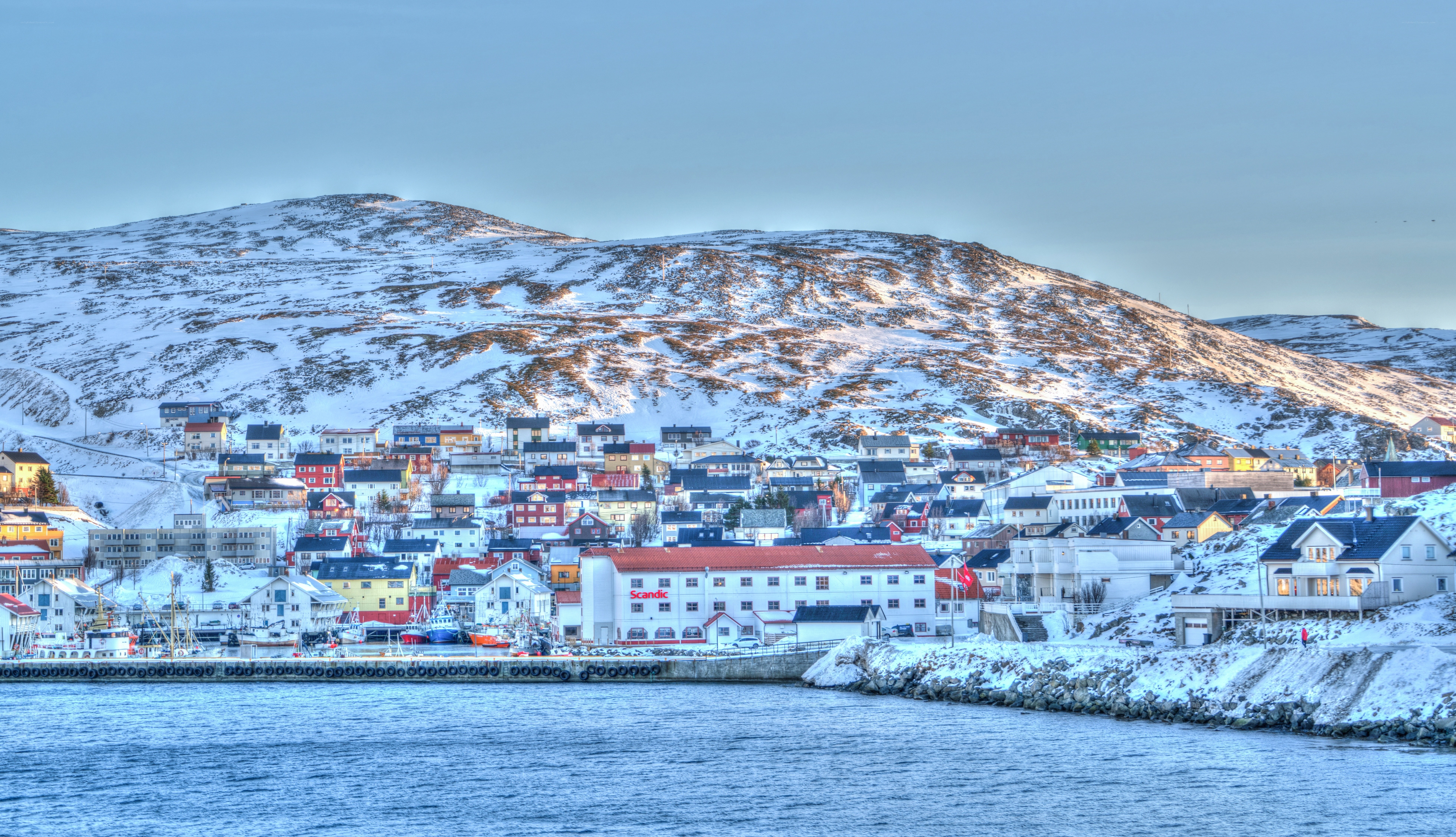 Snowy coastal town in Norway