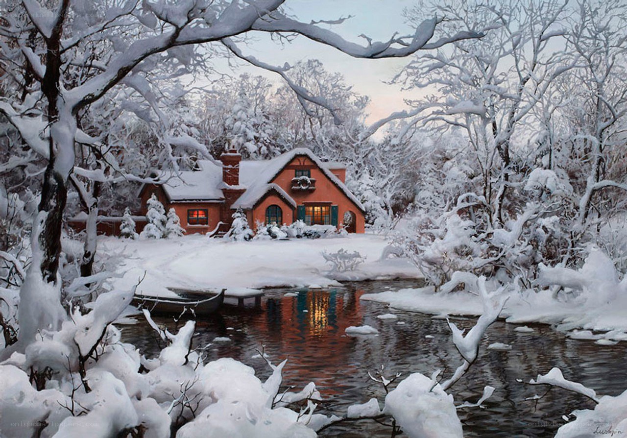 Snowy cottage by a river