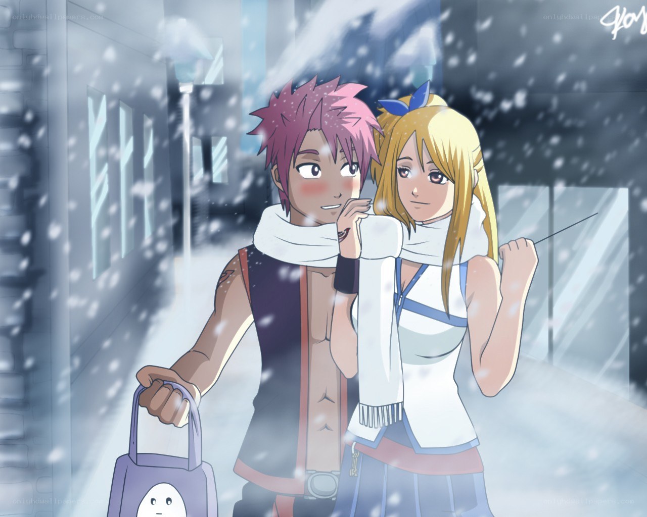 Snowy couple walk