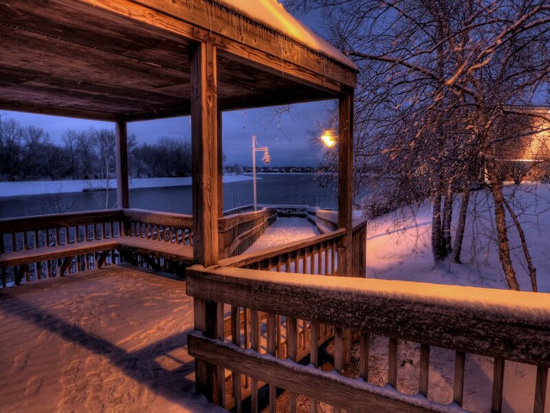 Snowy deck at dusk