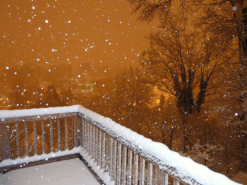 Snowy Deck at Night