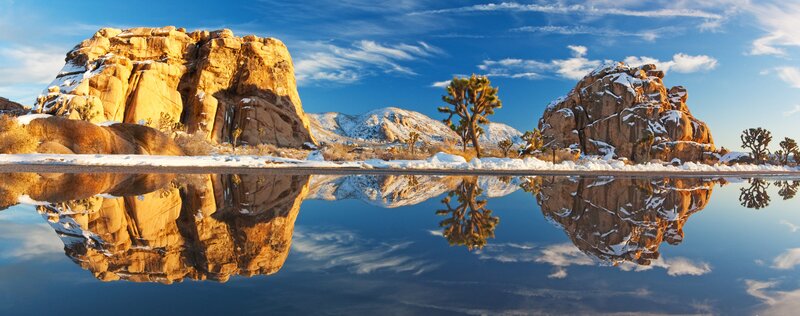 Snowy desert landscape with reflections