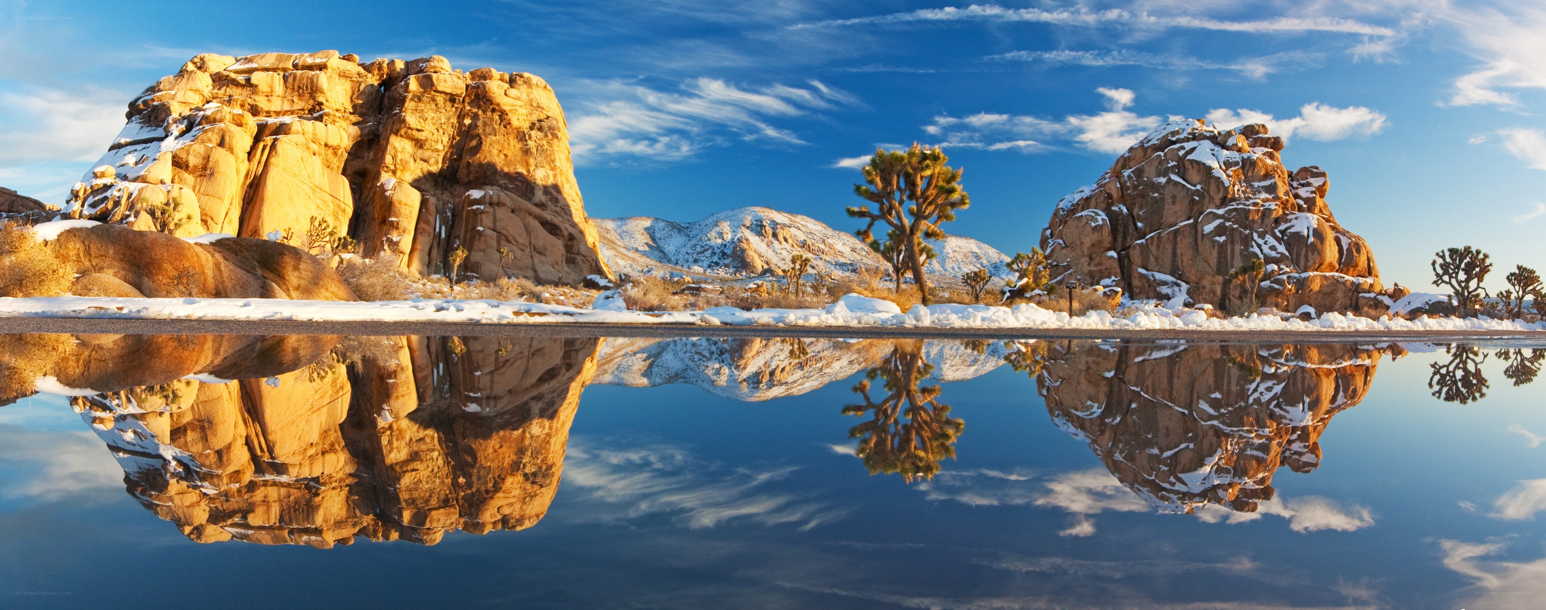 Snowy desert landscape with reflections