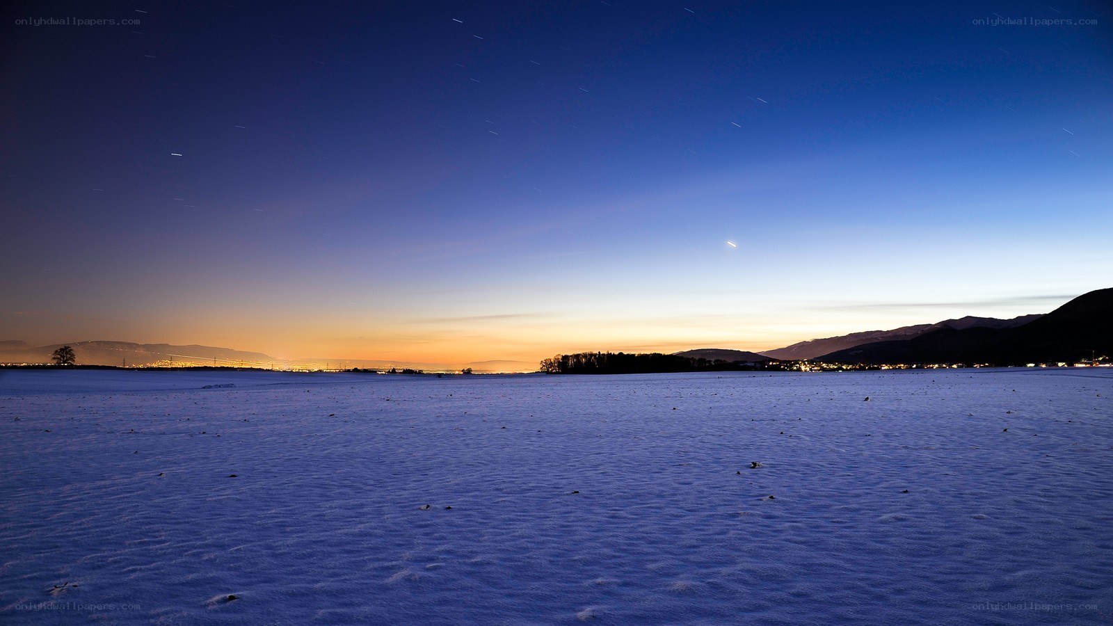 Snowy field at twilight