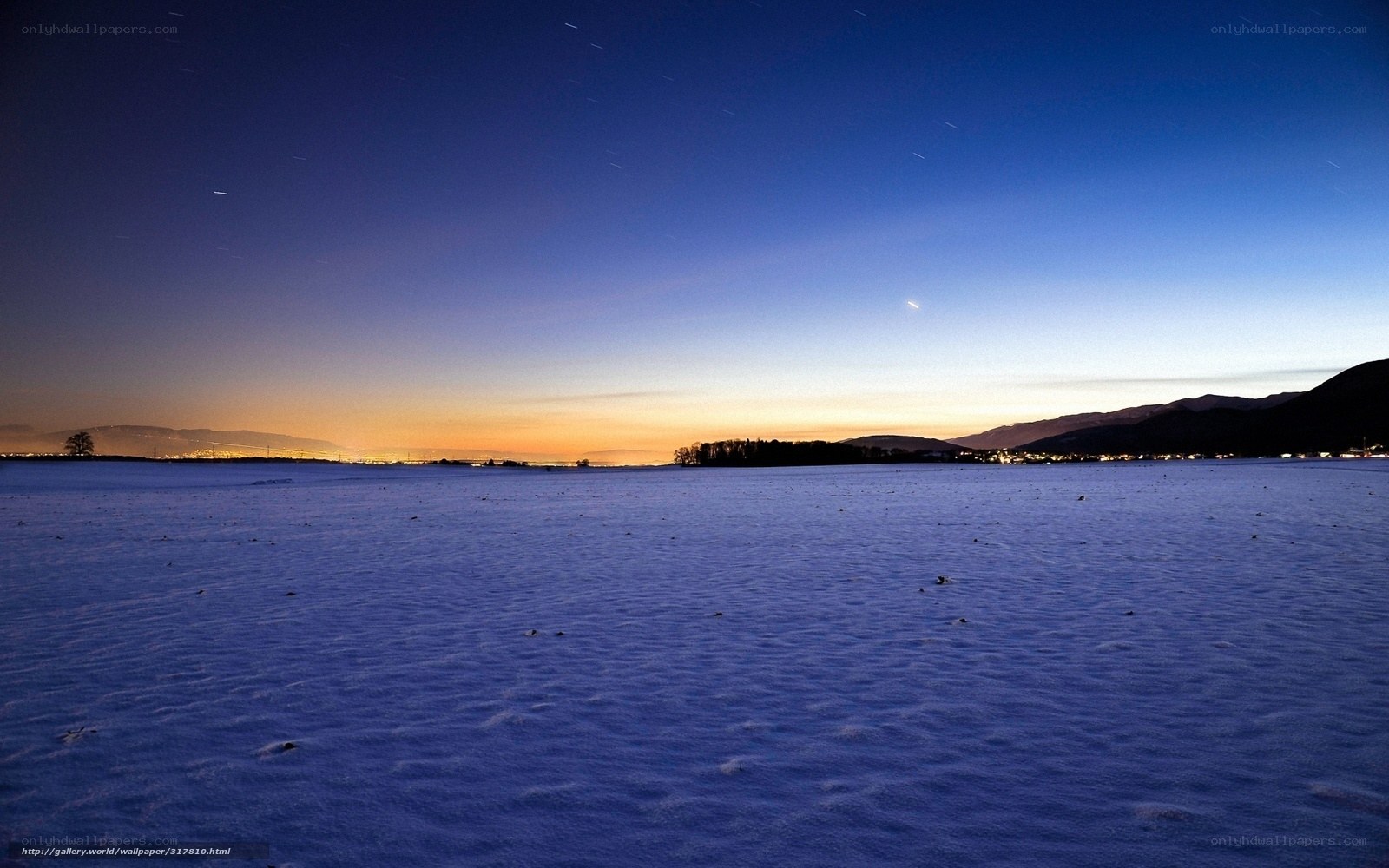 Snowy field at twilight