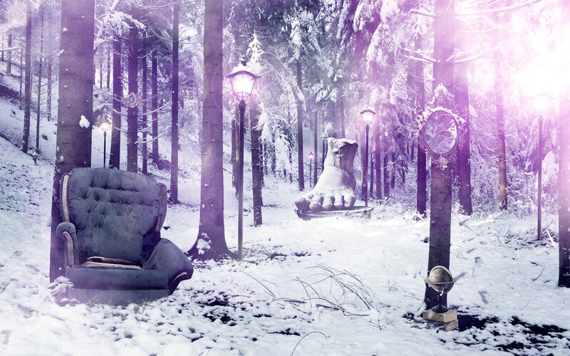 Snowy forest with giant foot and armchair