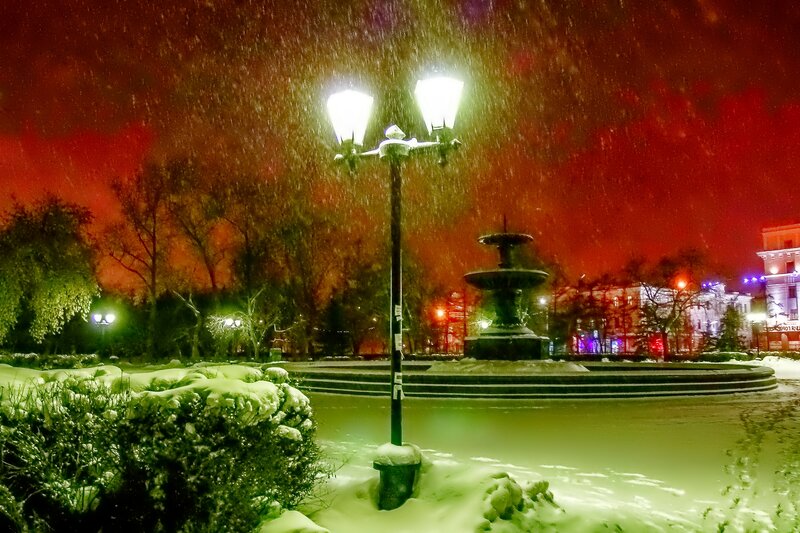Snowy Fountain at Night