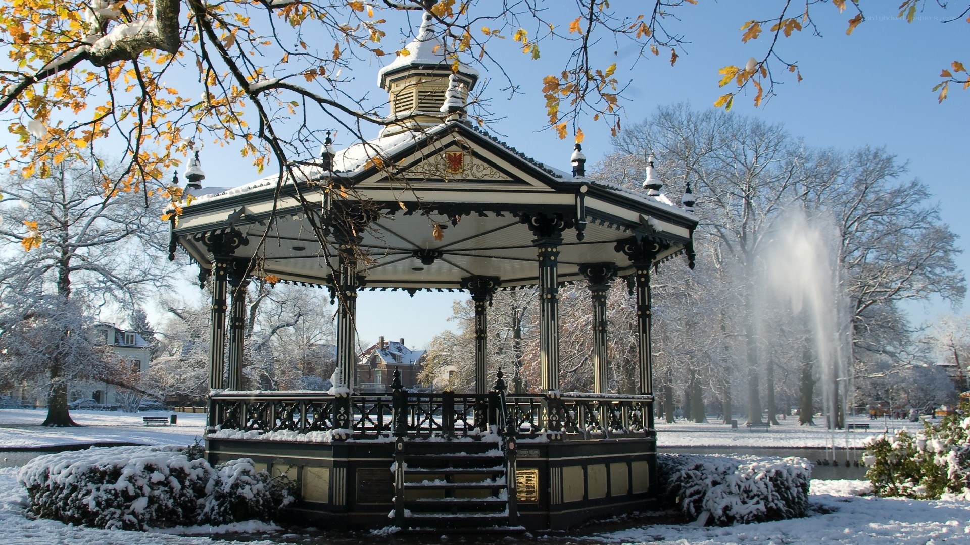 Snowy gazebo in park