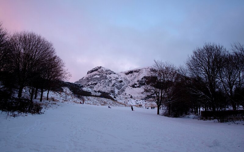 Snowy hill with Arthur's Seat
