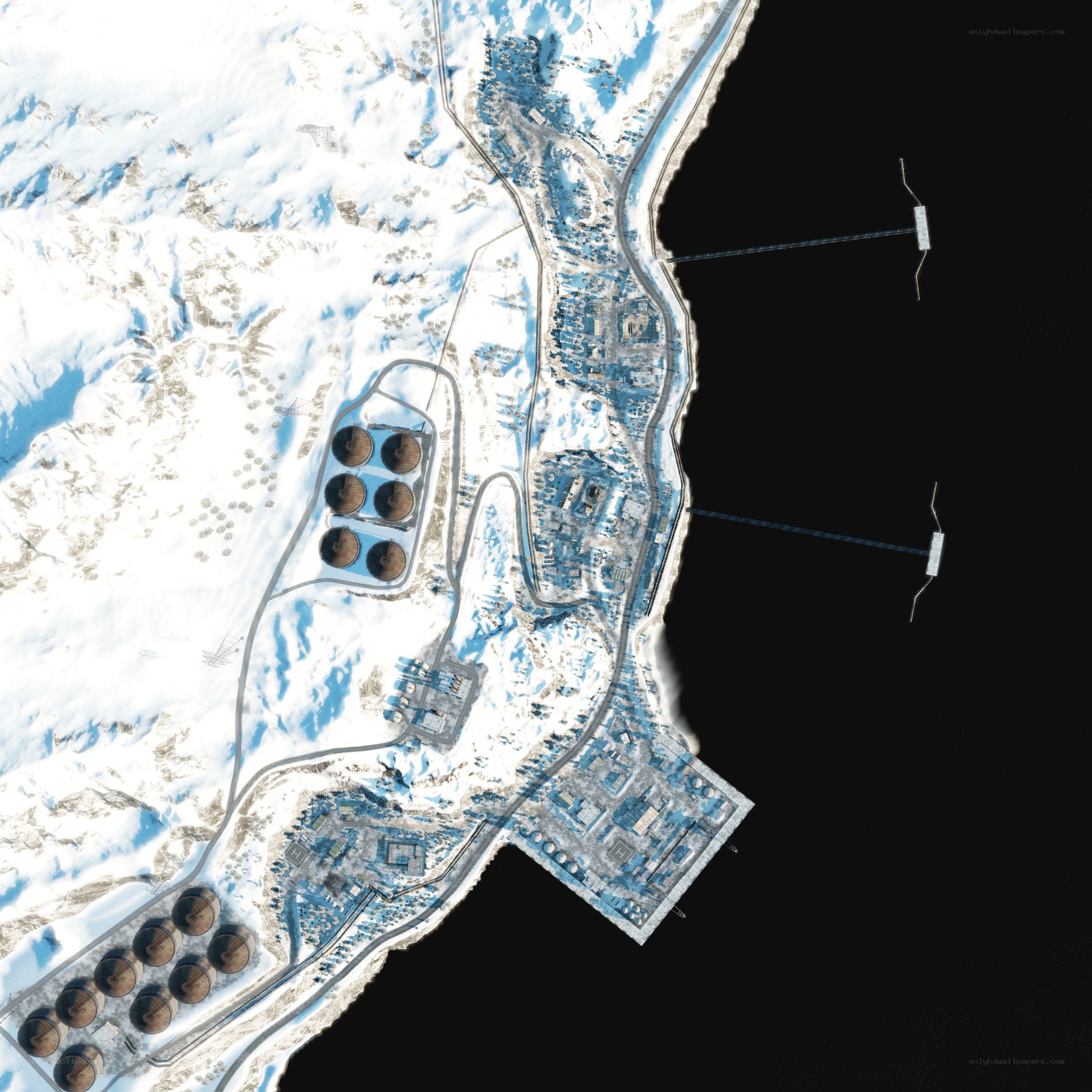 snowy industrial complex aerial view