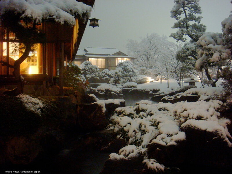 Snowy Japanese garden at night