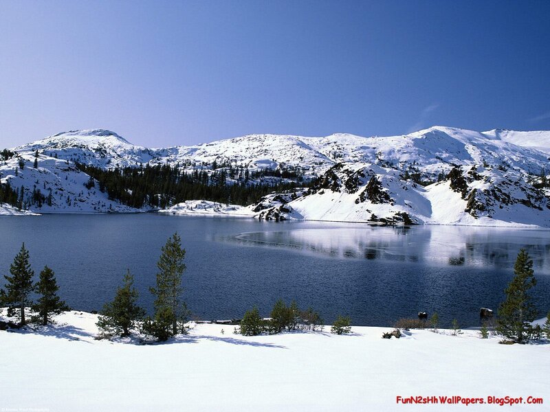 Snowy lake and mountains