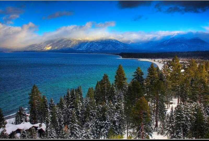 Snowy lake and mountains