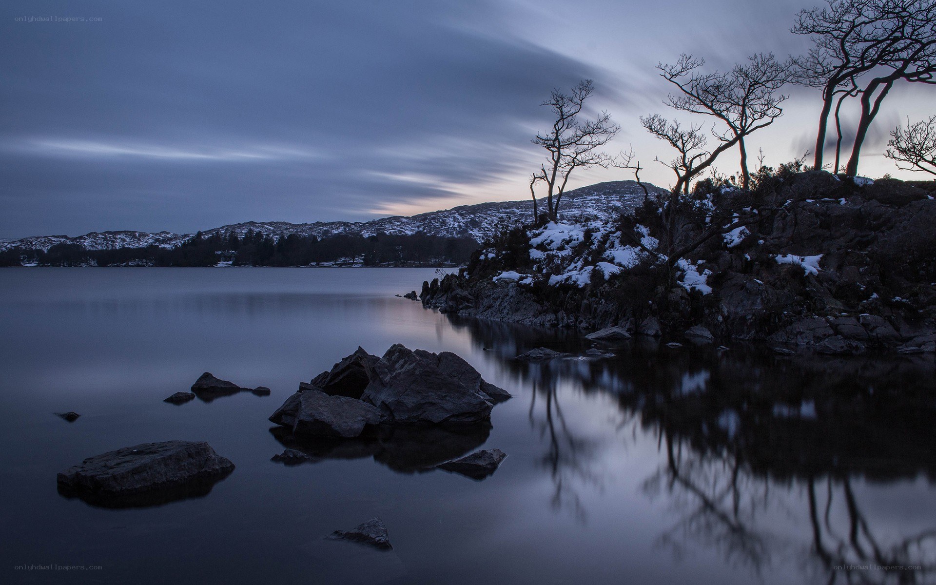 Snowy lake at dusk
