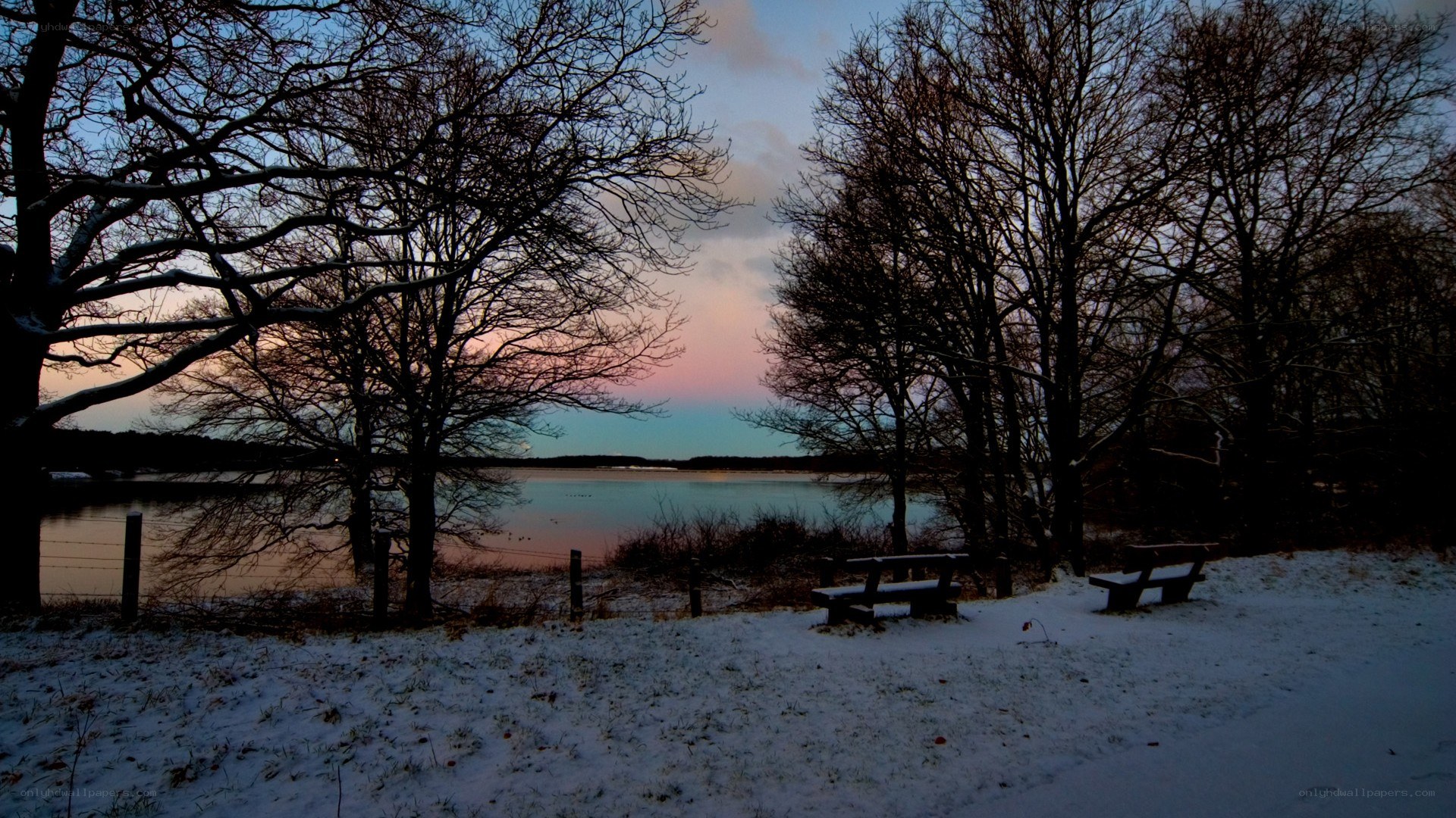 Snowy lake at dusk