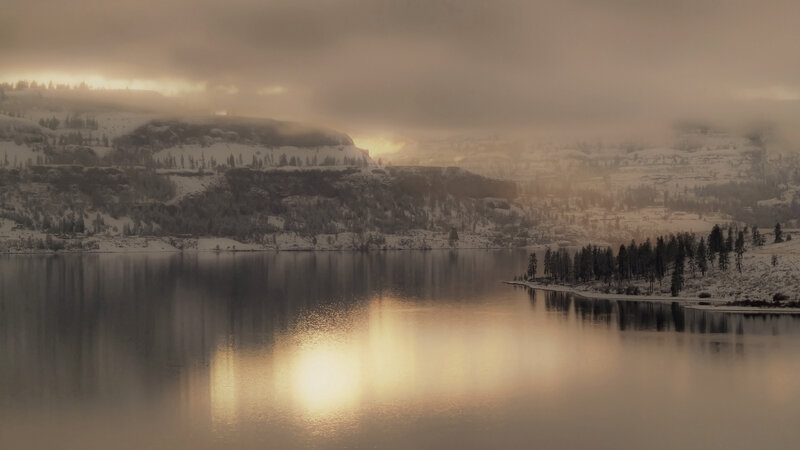 Snowy lake at sunrise