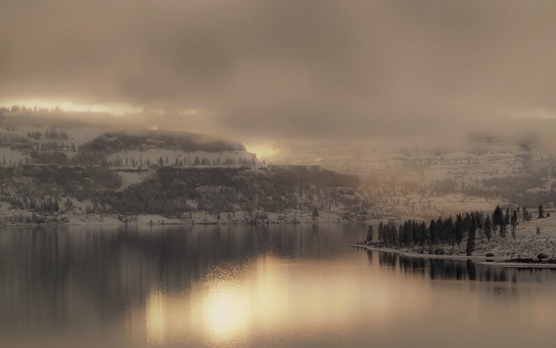 Snowy lake at sunrise