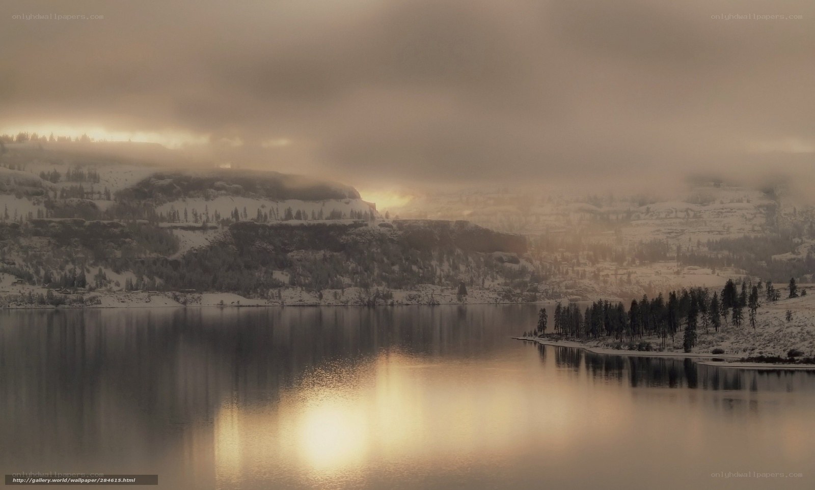 Snowy lake at sunrise
