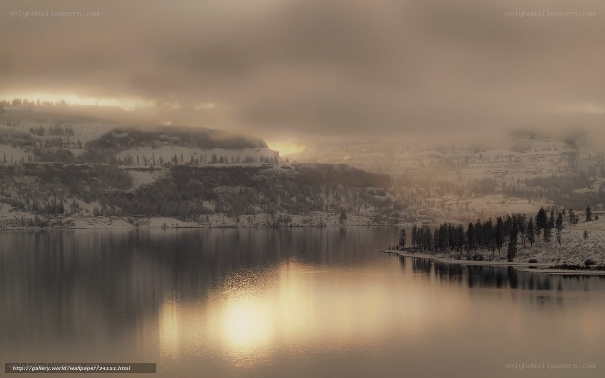 Snowy lake at sunrise