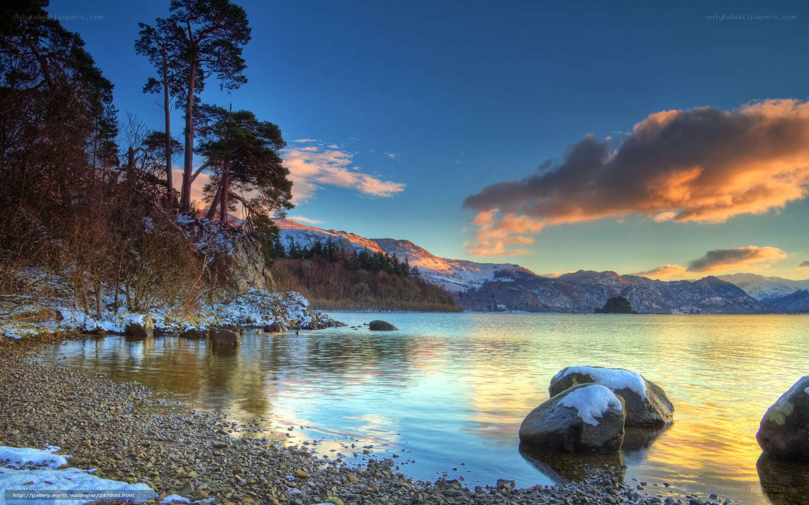Snowy lake at sunset