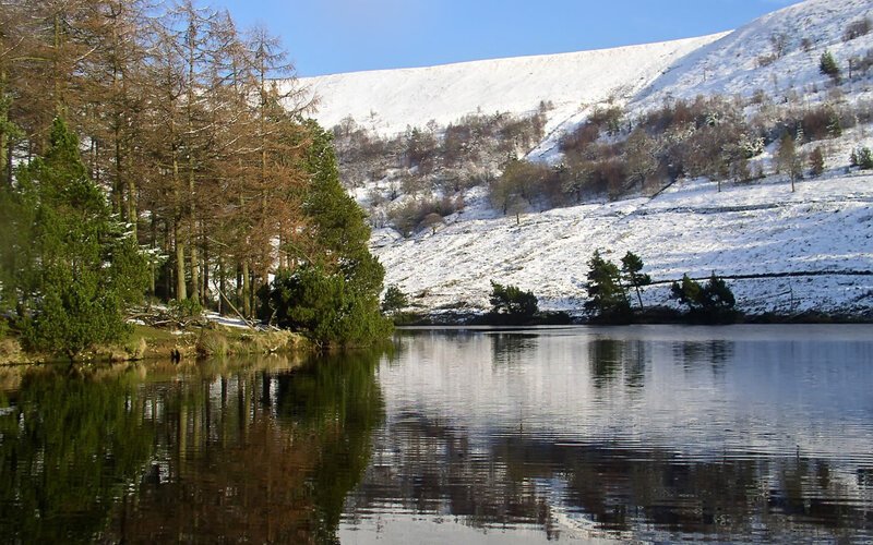 Snowy lake in winter landscape