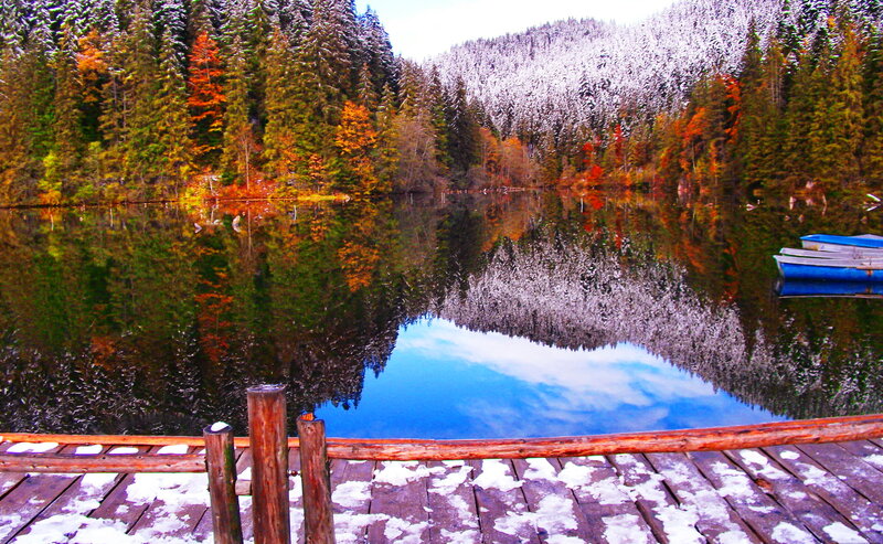 Snowy Lake with Boats