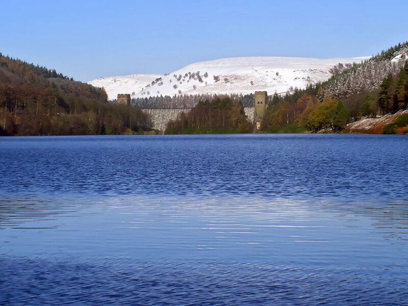 Snowy lake with dam