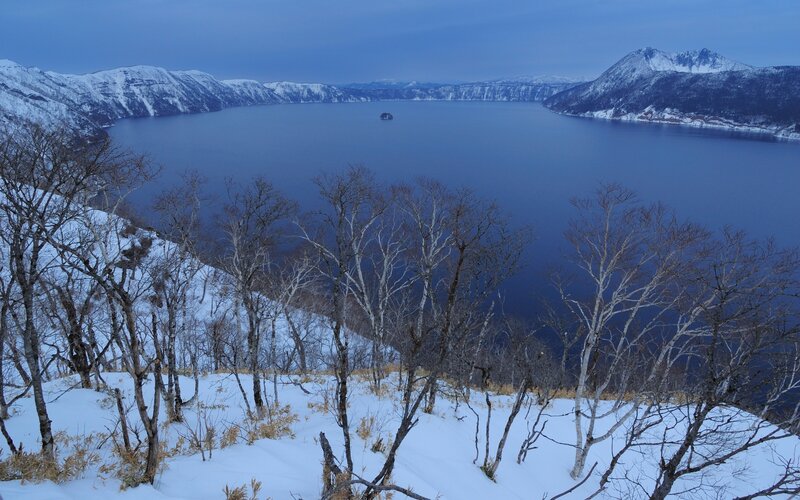 Snowy lake with island view