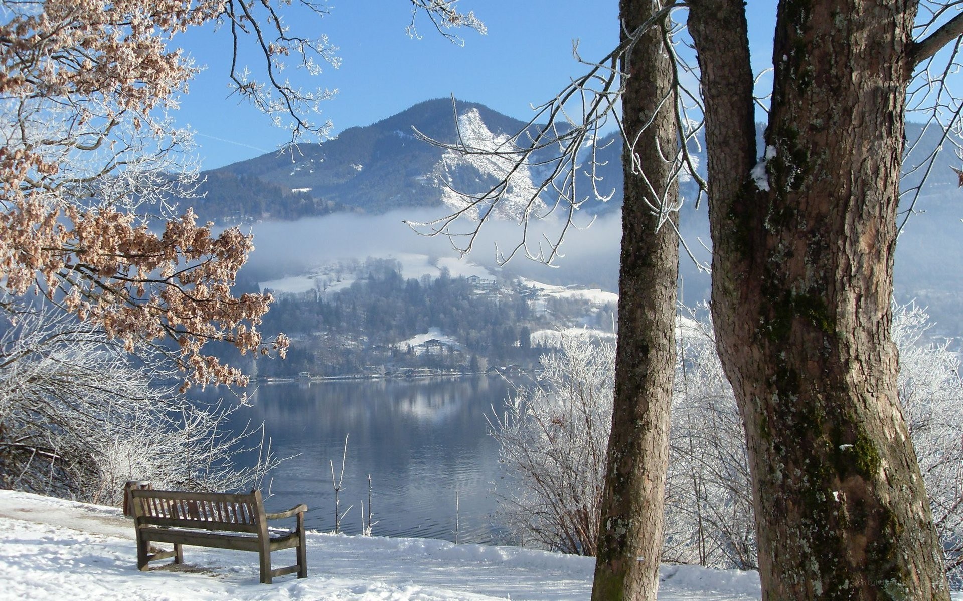 Snowy lake with mountain view