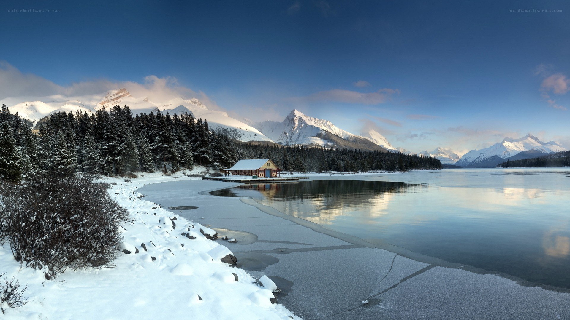 Snowy lake with mountain view