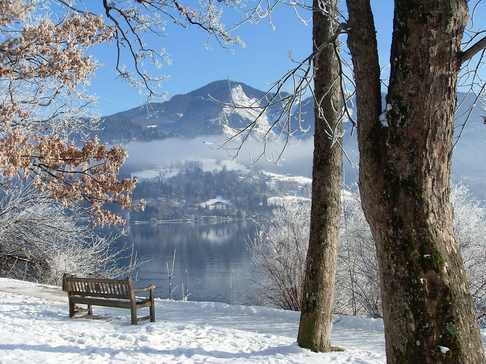 Snowy lake with mountains
